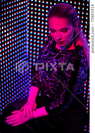 Sexy adorable night Party Model Girl in Pink purple neon light. Creative Colorful Bright Portrait Sexy adorable night Party Model Girl in Pink purple neon light. Creative Colorful Bright Portrait 75665919