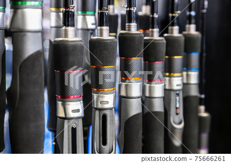 fishing rods of different construction and purpose on the counter of the store fishing rods of different construction and purpose on the counter of the store 75666261