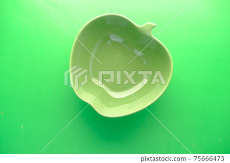 empty bowl on green background top down empty bowl on green background top down 75666473