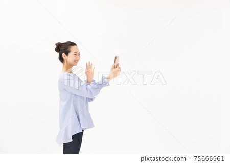 Woman making a video call 75666961