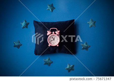 World Sleep day observed on March. National Sleep awareness Week. Blue pillow with alarm clock on blue background 75671347