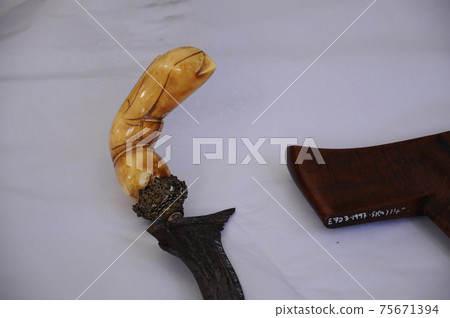 Keris is a traditional weapon of the Malay community in Malaysia. Made manually by using the selected iron. The handle is made of wood or ivory. 75671394
