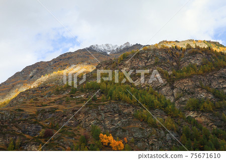 View of landscape snow alp mountain in autumn at countryside swiss View of landscape snow alp mountain in autumn at countryside swiss 75671610