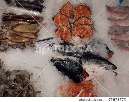 Thessaloniki, Greece Seafood counter with prices in Euros at a market. 75671775