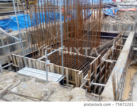 PUTRAJAYA, MALAYSIA -OCTOBER 13, 2017: Sheet pile cofferdam retaining wall at the construction site. It is installed to allow soil excavation and foundation work start.  75672281