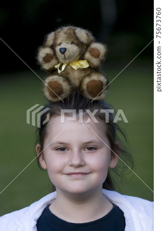 girl and teddy bear girl and teddy bear 75673760