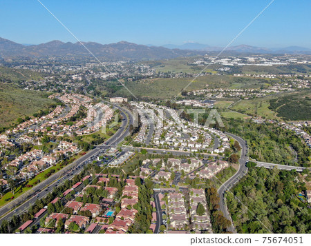 Aerial view of upper middle class neighborhood with big villas around in San Diego 75674051