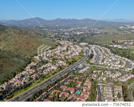 Aerial view of upper middle class neighborhood with big villas around in San Diego 75674052