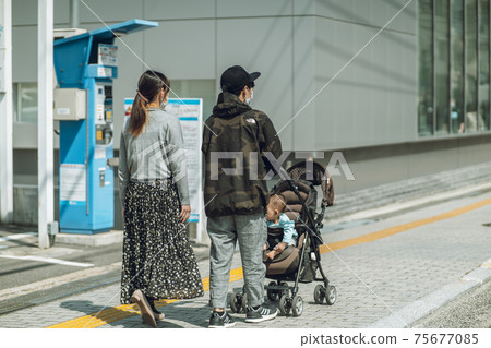 Passerby back view 75677085