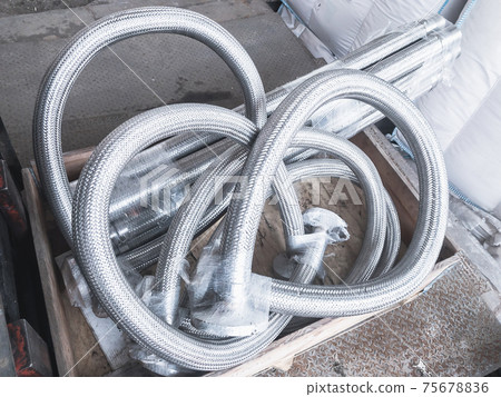 Long metal flexible compensator pipes metal texture Long metal flexible compensator pipes metal texture 75678836