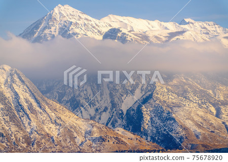 Amazing view of Mount Timpanogos with slopes and peak covered with snow Amazing view of Mount Timpanogos with slopes and peak covered with snow 75678920