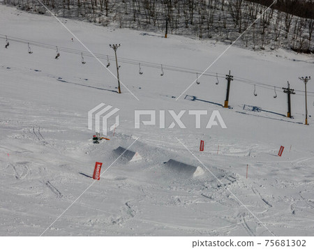 Mogul skiing at Hakuba Norikura Onsen Ski Resort 75681302