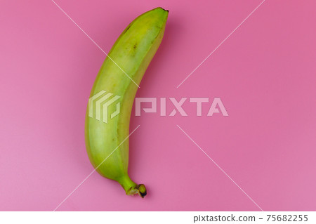 Yellow banana on pink background. Top view, flat lay, minimal design 75682255