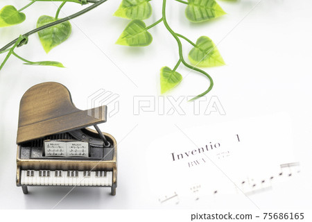 Grand piano white background sheet music image indoor studio shooting 75686165