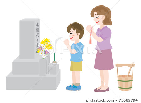 Mother and son visiting the grave 75689794