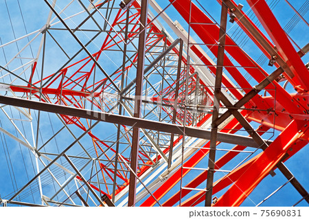Structure of red and white transmission tower Structure of red and white transmission tower 75690831