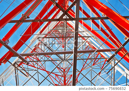 Structure of red and white transmission tower Structure of red and white transmission tower 75690832