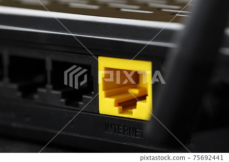 Yellow Internet connector for connection to the network, Wi-Fi router for Internet access Yellow Internet connector for connection to the network, Wi-Fi router for Internet access 75692441