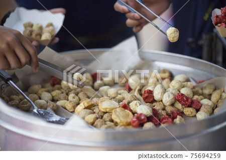 Thai food, meatballs with sauce on white place, close up Thai food, meatballs with sauce on white place, close up 75694259