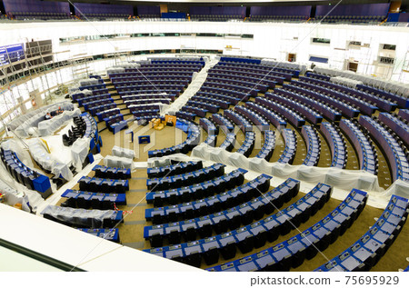 Strasbourg, France. August 2019. View of the parliamentary hemicycle during the summer break. Maintenance work is in progress: some protective tarpaulins are visible Strasbourg, France. August 2019. View of the parliamentary hemicycle during the summer break. Maintenance work is in progress: some protective tarpaulins are visible 75695929