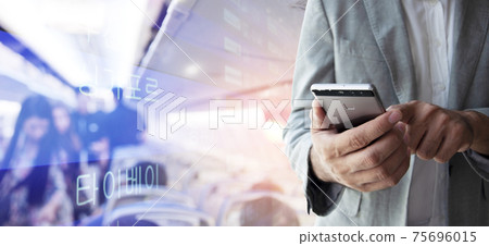 Businessman use smartphone for booking a flight ticket. 75696015