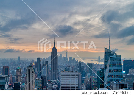 New York skyline from the top of  The rock observation deck in Rockefeller center sunset view with clouds in the sky 75696351