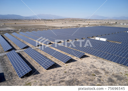 Modern solar panels farm. Renewable energy concept. Modern solar panels farm. Renewable energy concept. 75696545