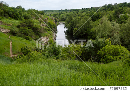 Buky Canyon summer landscape, Hirskyi Tikych river, Cherkasy Region, Ukraine. 75697285