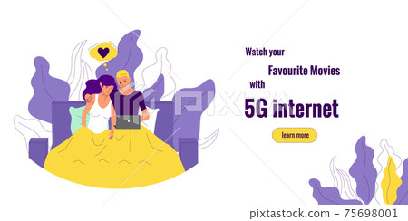 Couple is laying under a blanket on a bed and watching movie on laptop. Couple is laying under a blanket on a bed and watching movie on laptop. 75698001