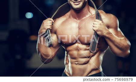 fit man training muscles at gym. fit man training muscles at gym. 75698979