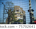 The new national stadium reflected in the building in front of you 75702641