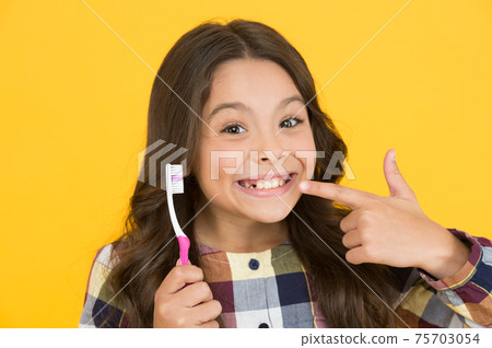 She had her baby tooth out. Happy child show milk tooth She had her baby tooth out. Happy child show milk tooth 75703054