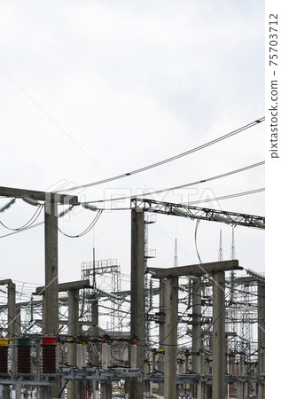 Power plant is a station of transformation. A lot of cables, poles and wires, transformers. Electro-energy. Power plant is a station of transformation. A lot of cables, poles and wires, transformers. Electro-energy. 75703712