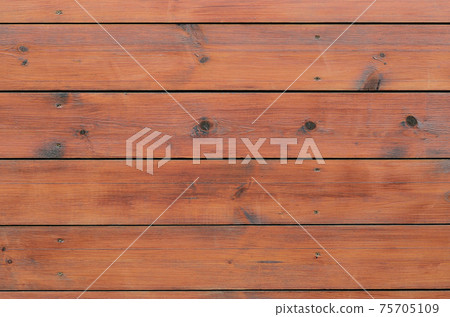 Varnished wood background from cabin exterior. Brown wood barn plank Varnished wood background from cabin exterior. Brown wood barn plank 75705109