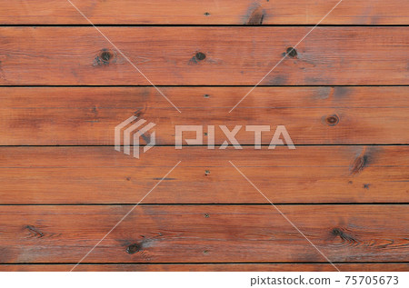 Varnished wood background from cabin exterior. Brown wood barn plank Varnished wood background from cabin exterior. Brown wood barn plank 75705673