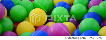 Swimming pool for fun and jumping in colored plastic balls Swimming pool for fun and jumping in colored plastic balls 75705765