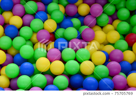 Swimming pool for fun and jumping in colored plastic balls Swimming pool for fun and jumping in colored plastic balls 75705769