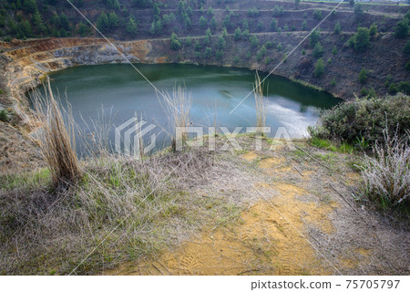 Abandoned open pit mine of North Mathiatis, Cyprus Abandoned open pit mine of North Mathiatis, Cyprus 75705797