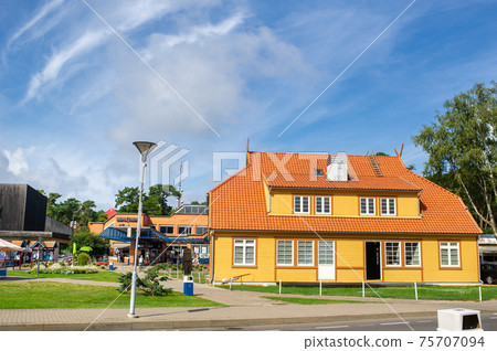 August 17, 2017 Nida, Lithuania, old Lithuanian traditional wooden house in Nida 75707094