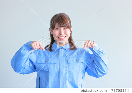 Pose pointing down_woman in uniform Pose pointing down_woman in uniform 75708324