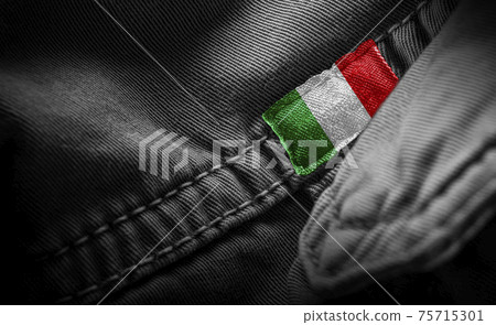Tag on dark clothing in the form of the flag of the Italy Tag on dark clothing in the form of the flag of the Italy 75715301