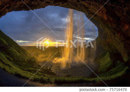 the majestic Seljalandsfoss Falls against the sunset. Iceland the majestic Seljalandsfoss Falls against the sunset. Iceland 75716470