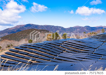 A large number of solar panels (power generation equipment) installed on the slopes of mountains A large number of solar panels (power generation equipment) installed on the slopes of mountains 75717635
