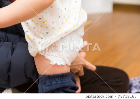 Seniors changing children 75718163