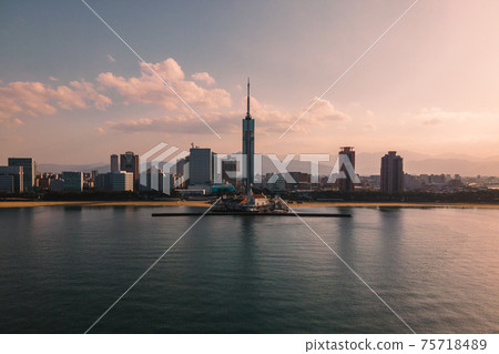Fukuoka Tower seen from a distance on Momochi Beach in Fukuoka 75718489