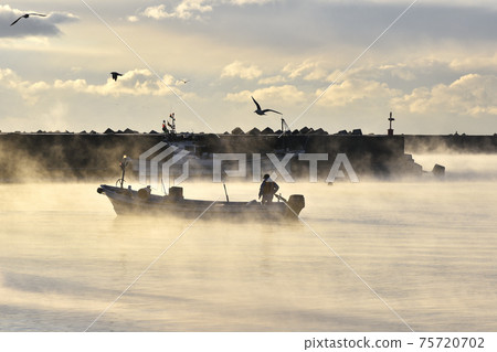 A stormy fishing port A stormy fishing port 75720702