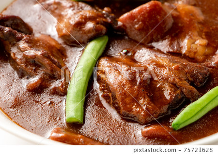 Up of beef tongue stew. Up of beef tongue stew. 75721628