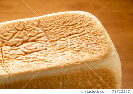 Up the surface of bread (square bread). 75722137