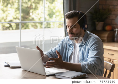 Caucasian man talk on video call on laptop 75723549