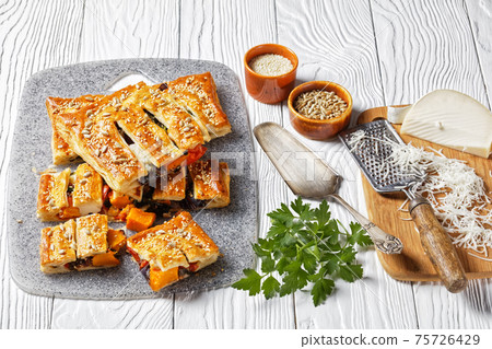 American vegetable puff pastry pie with cheese 75726429